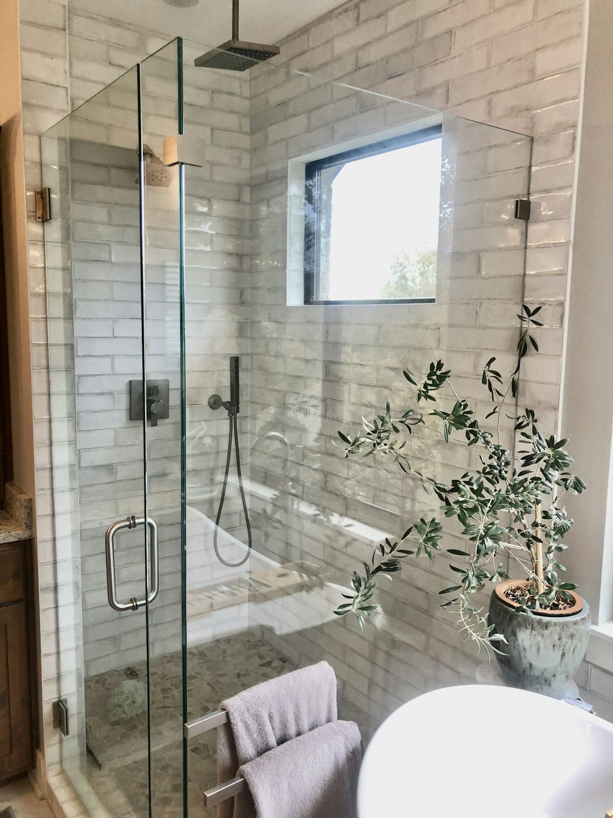 Custom frameless shower door installed by Clear Pro Glass
